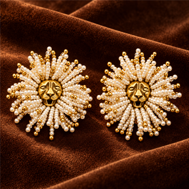 Golden Lion sunburst statement earrings on cocoa velvet