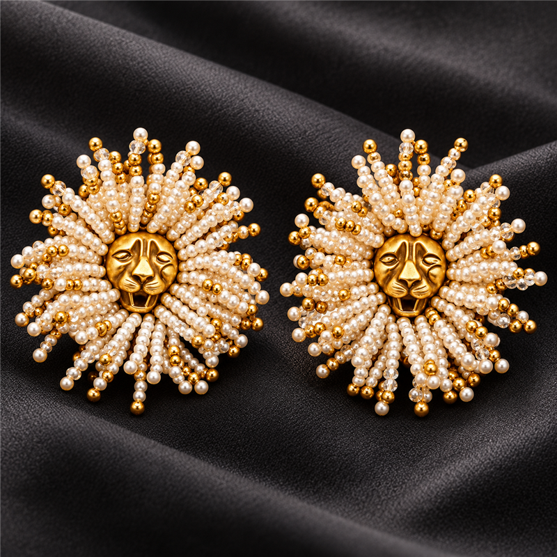 Golden Lion sunburst statement earrings on charcoal fabric