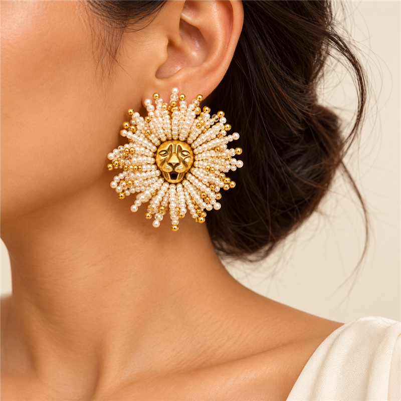 Golden Lion sunburst statement earring worn on ear