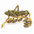 Verdant Muse crystal grasshopper brooch on white background